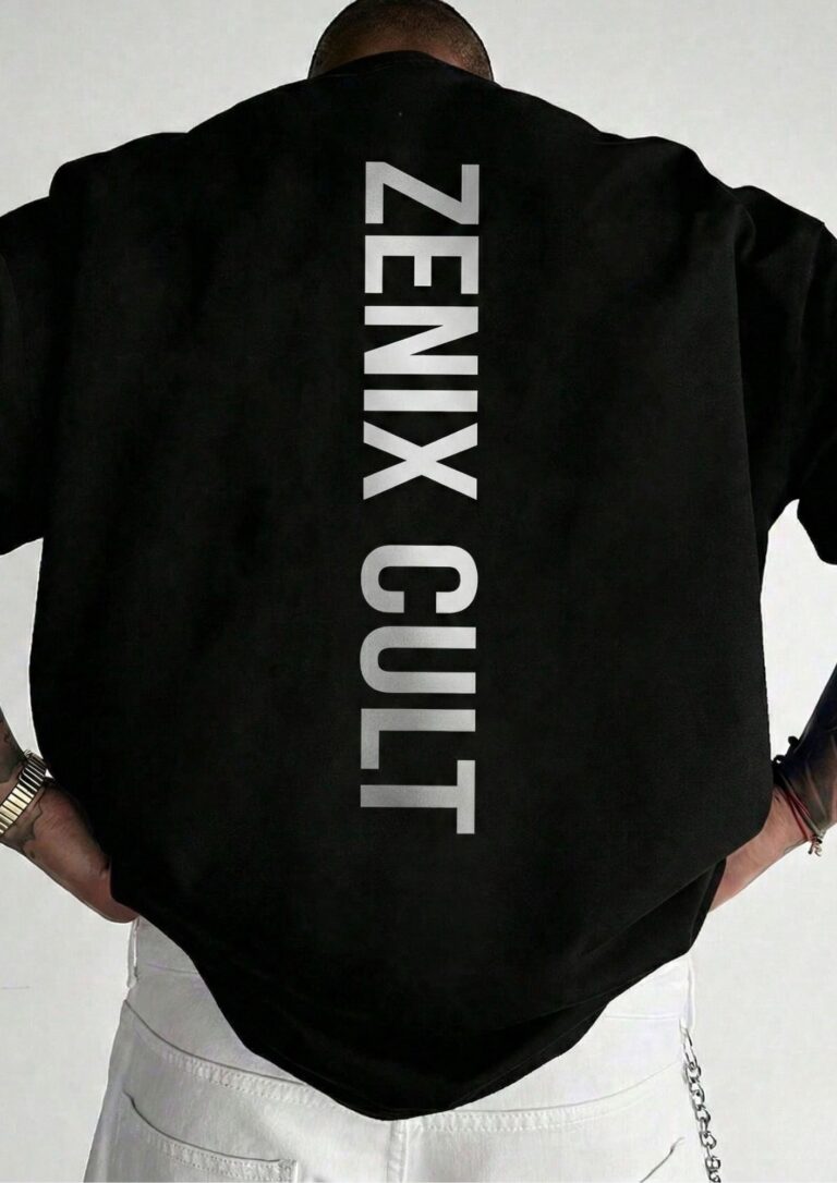 Black oversized streetwear t-shirt with bold vertical “Zenix Cult” typography on the back worn by a model
